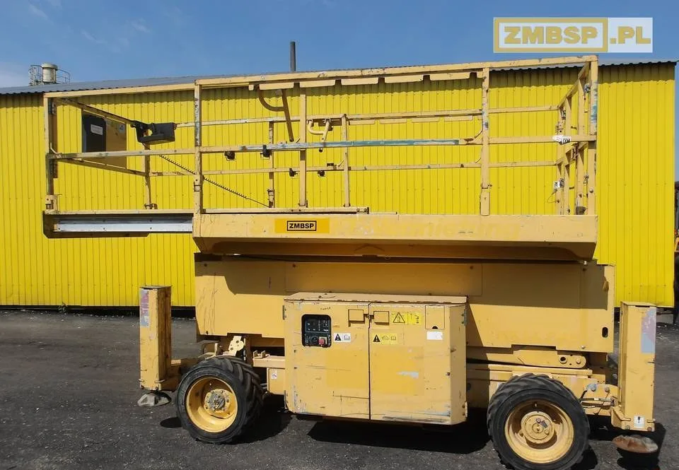 Podnośnik nożycowy spalinowy 14m 4x4 Genie GS4069 RT
